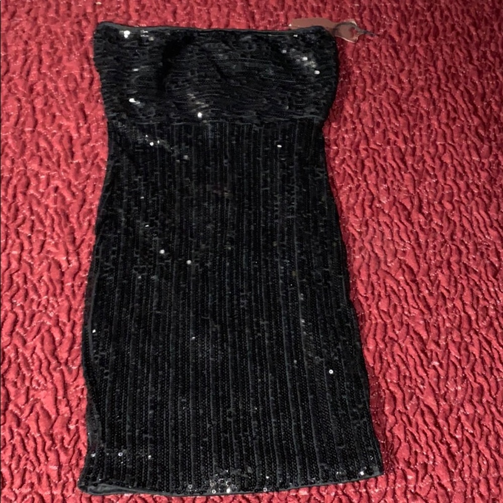 Strapless Sequenced mini dress.